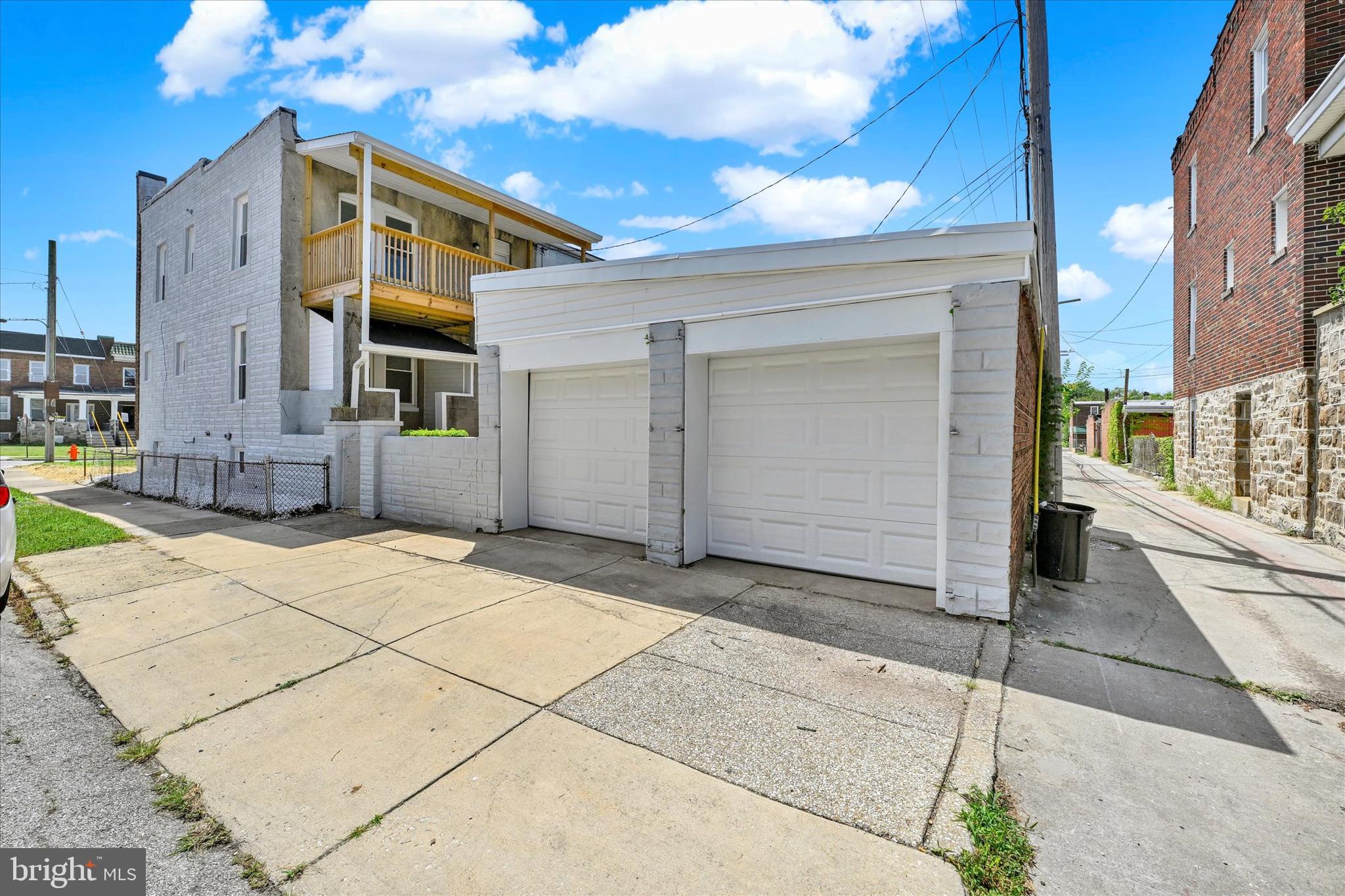 2400 West Lafayette Avenue Baltimore, MD 21216 - Photo 33 of 33 a front view of a house with a garage