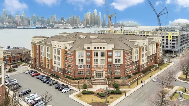 a view of a city with an ocean view