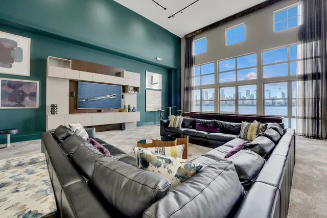 a view of a living room with a large window