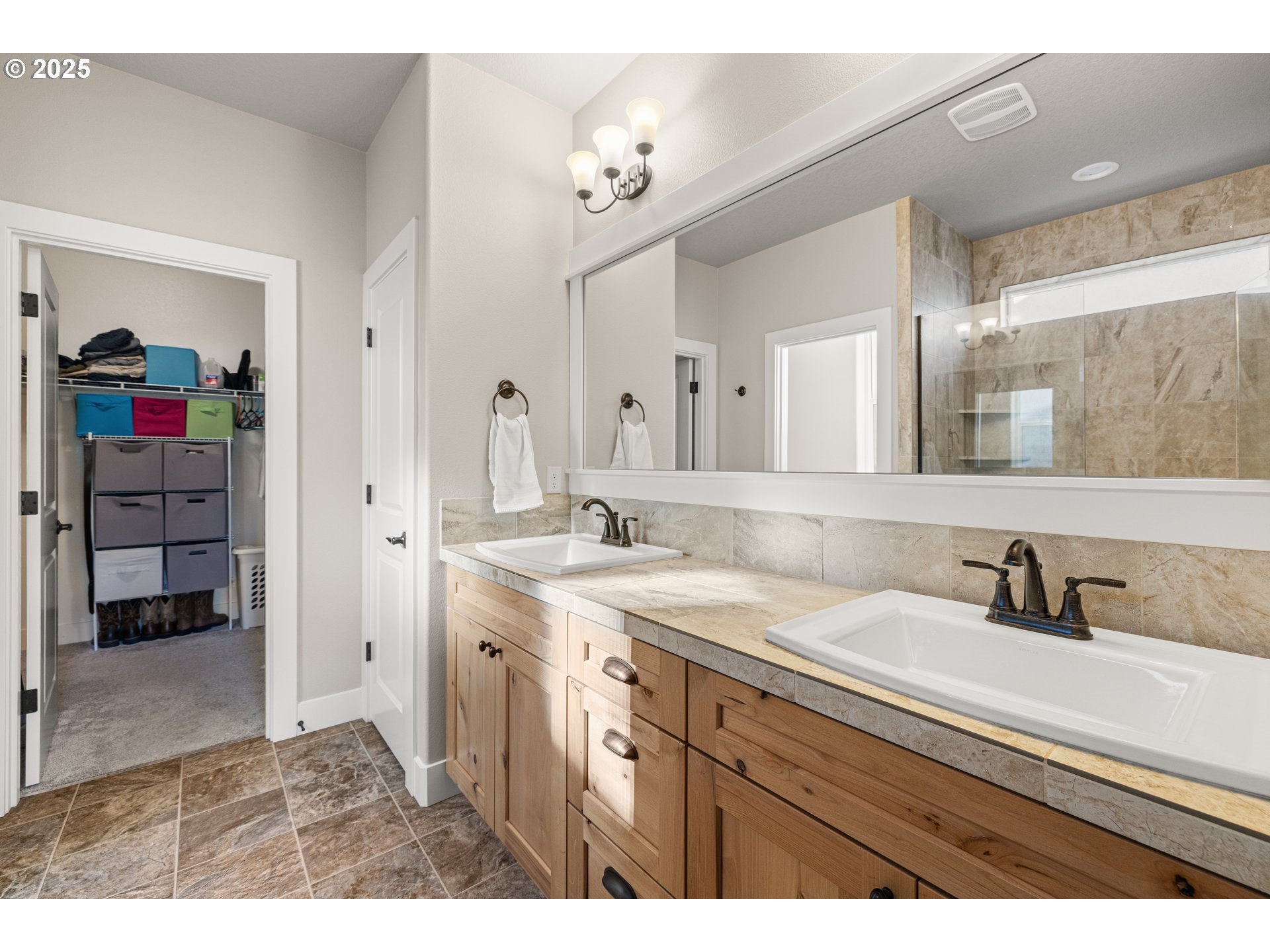 2344 Southeast 27th Street Battle Ground, WA 98604 - Photo 24 of 48 a bathroom with a sink vanity and a mirror