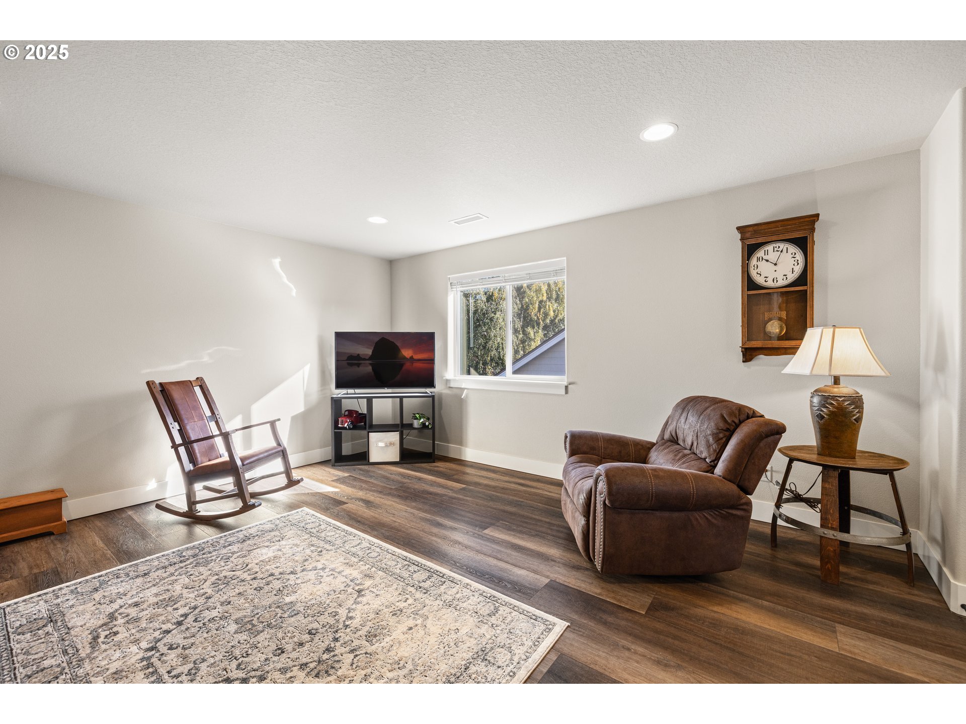 2344 Southeast 27th Street Battle Ground, WA 98604 - Photo 29 of 48 a living room with furniture and a flat screen tv