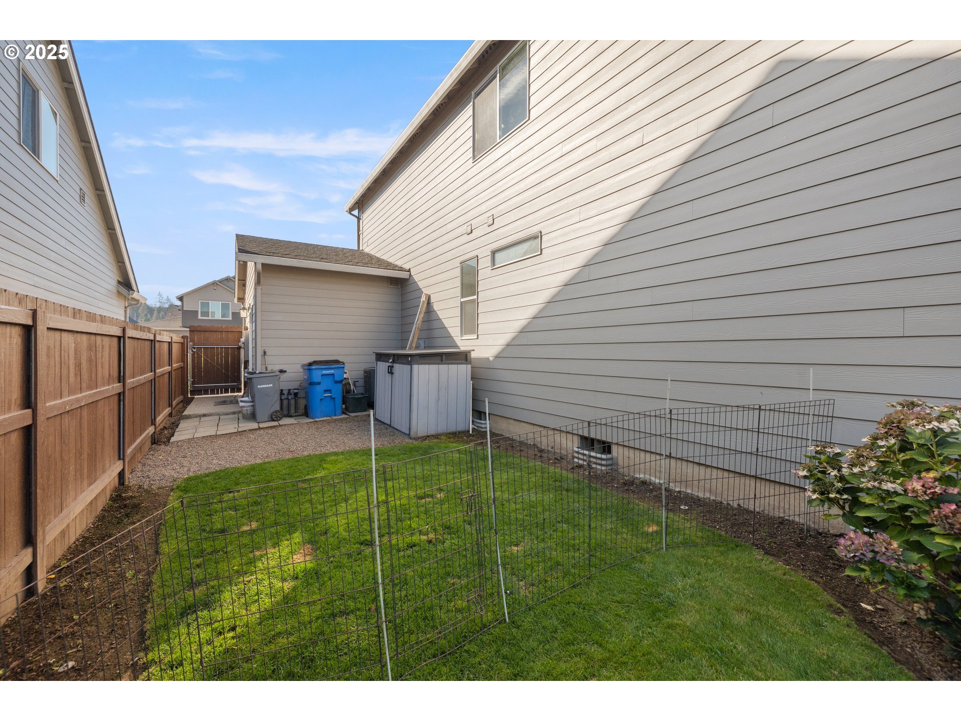 2344 Southeast 27th Street Battle Ground, WA 98604 - Photo 39 of 48 a view of a backyard with plants and a backyard