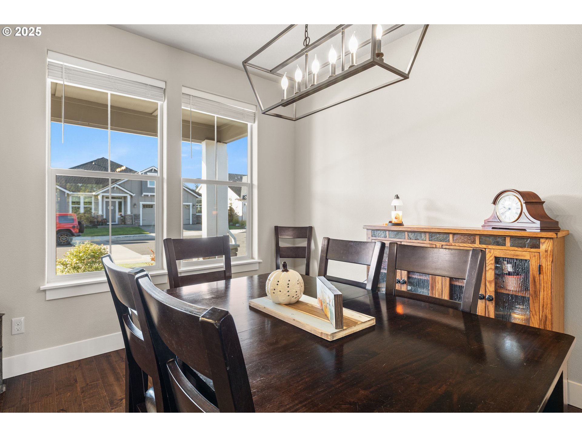 2344 Southeast 27th Street Battle Ground, WA 98604 - Photo 9 of 48 a dining room with furniture a chandelier and wooden floor