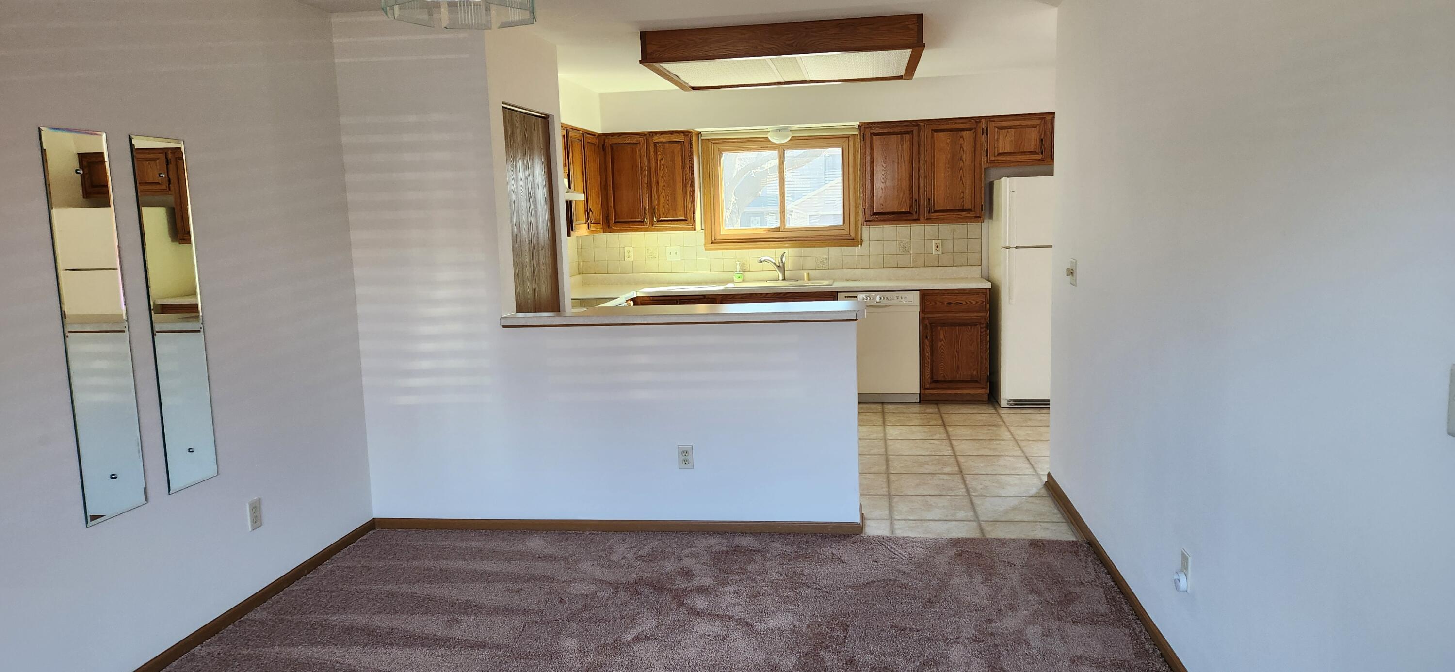 5516 Cambridge Lane, Unit 4 Mount Pleasant, WI 53406 - Photo 3 of 20 Dining room