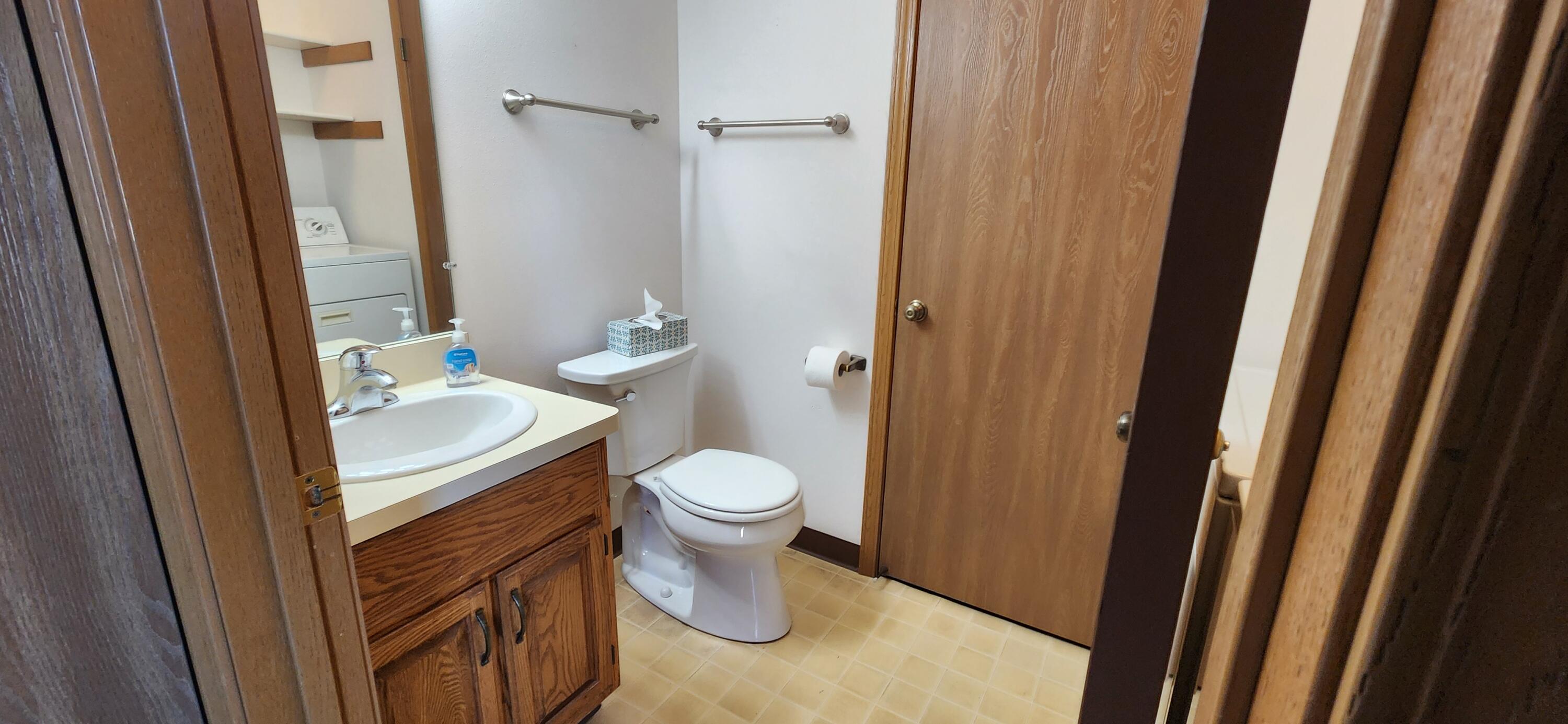 5516 Cambridge Lane, Unit 4 Mount Pleasant, WI 53406 - Photo 10 of 20 Lower half bath/laundry