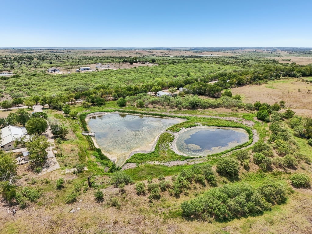 Tbd Tbd Bluebonnet Road Lockhart, TX 78644 - Photo 6 of 20 an aerial view of a residential houses with outdoor space and trees
