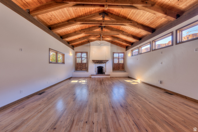 423 Amber Lane Moab, UT 84532 - Photo 11 of 63 Open living area with oak floor and hand carved mantle.