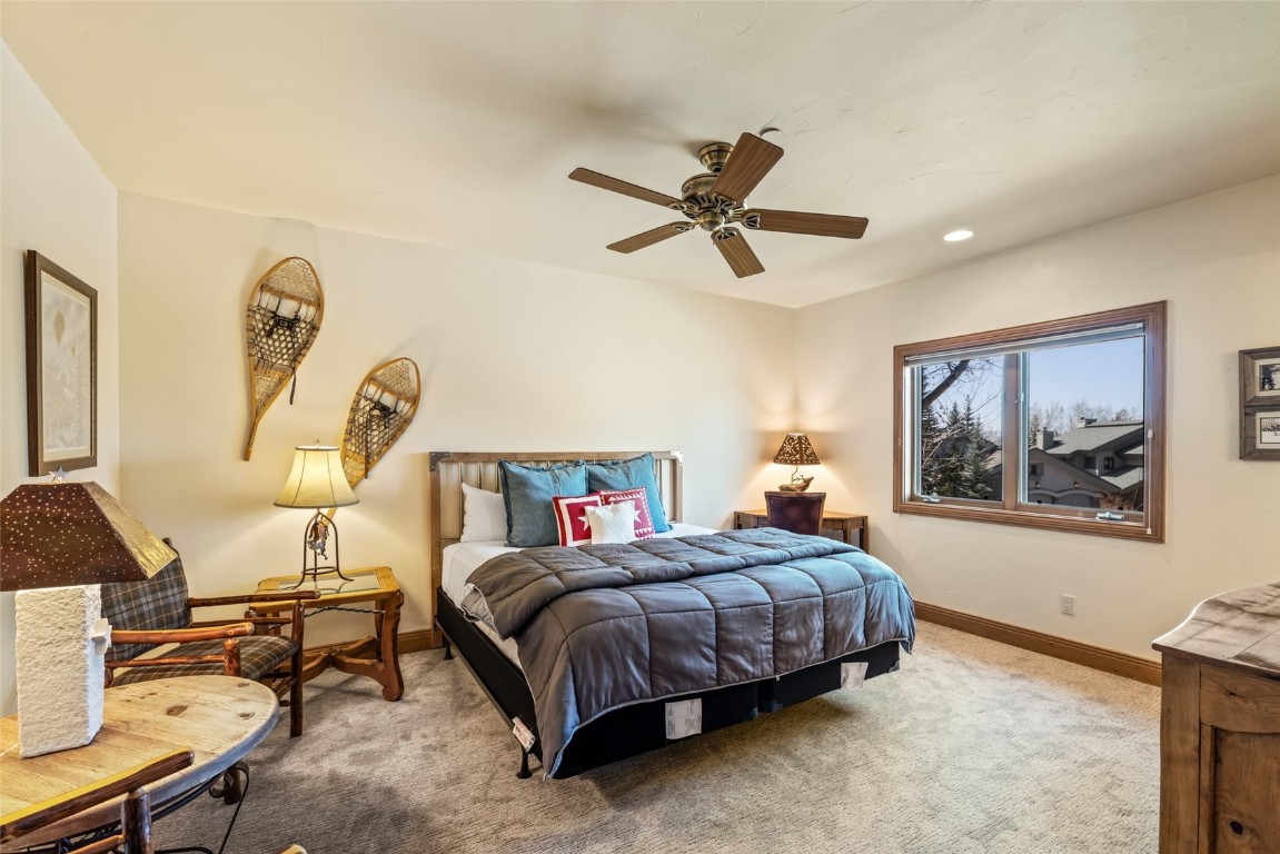 2685 Timber Court, Unit 2 Steamboat Springs, CO 80487 - Photo 22 of 31 Carpeted bedroom with recessed lighting, baseboards, and a ceiling fan