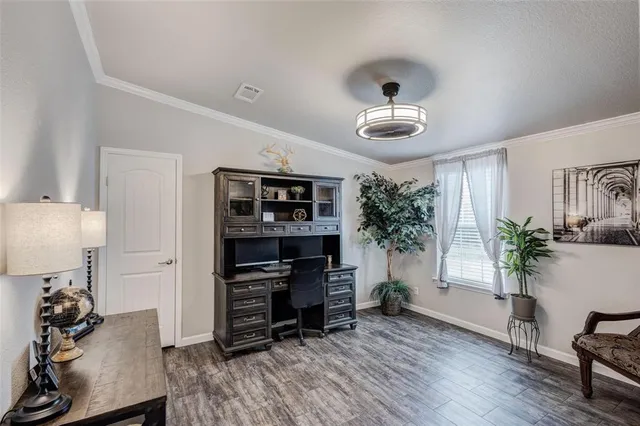 a bedroom with bed and a window