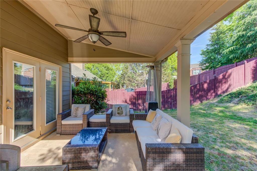 7772 Copper Kettle Way Flowery Branch, GA 30542 - Photo 32 of 43 a building outdoor space with patio furniture