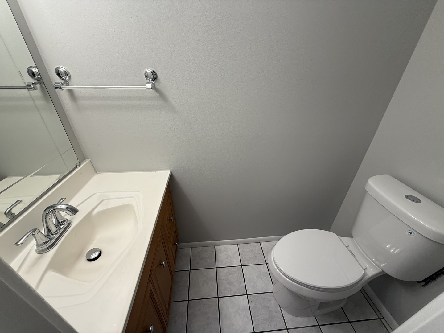 744 West Gordon Terrace, Unit 305 Chicago, IL 60613 - Photo 6 of 12 a bathroom with a toilet and a sink