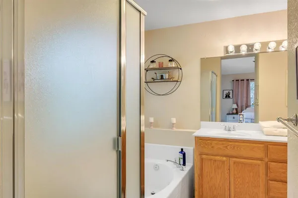 a view of a swimming pool with a patio