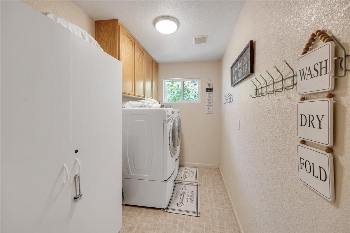 2441 Quail Hill Road, Unit 262 Copperopolis, CA 95228 - Photo 39 of 90 Large laundry with storage.