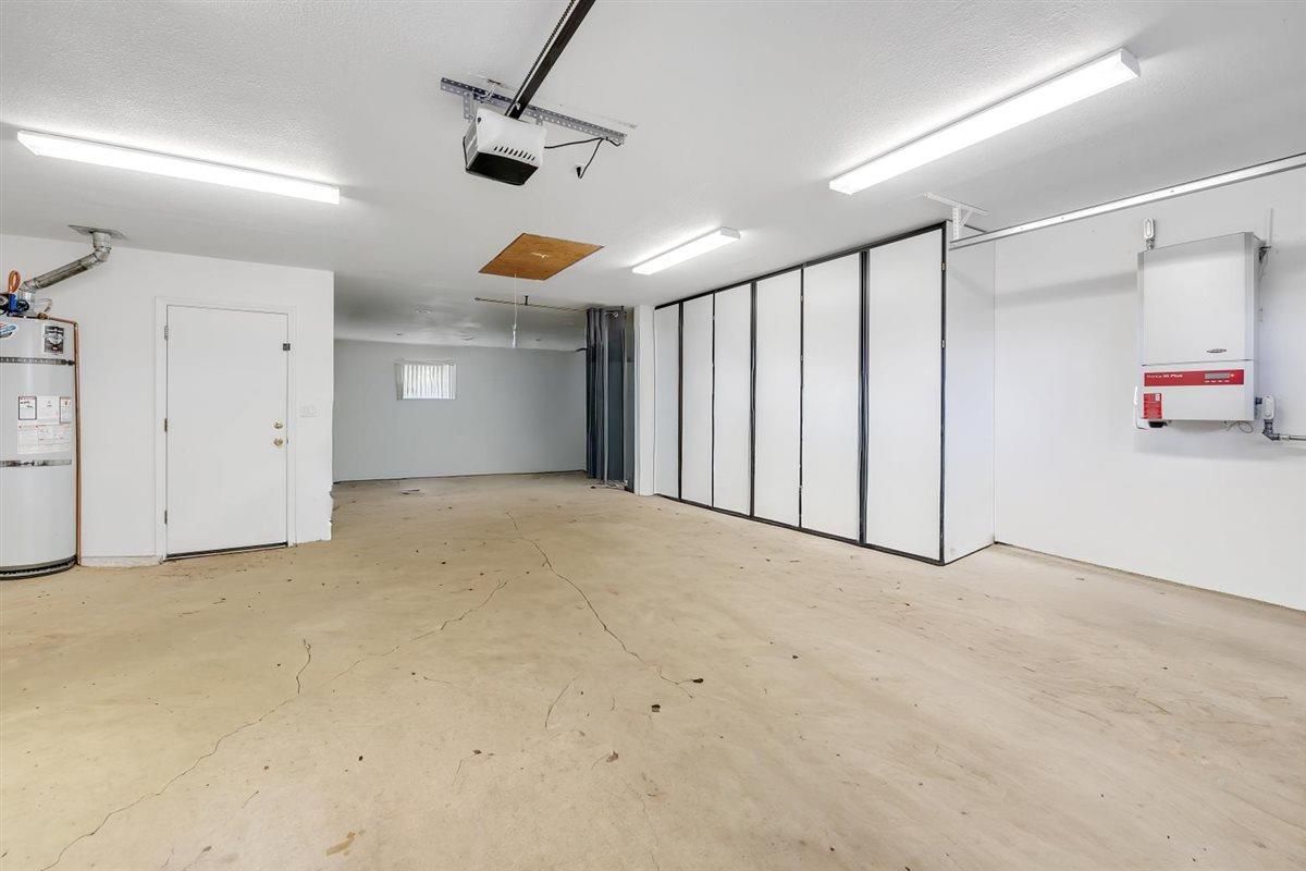 2441 Quail Hill Road, Unit 262 Copperopolis, CA 95228 - Photo 42 of 90 an empty room with ceiling fan and windows