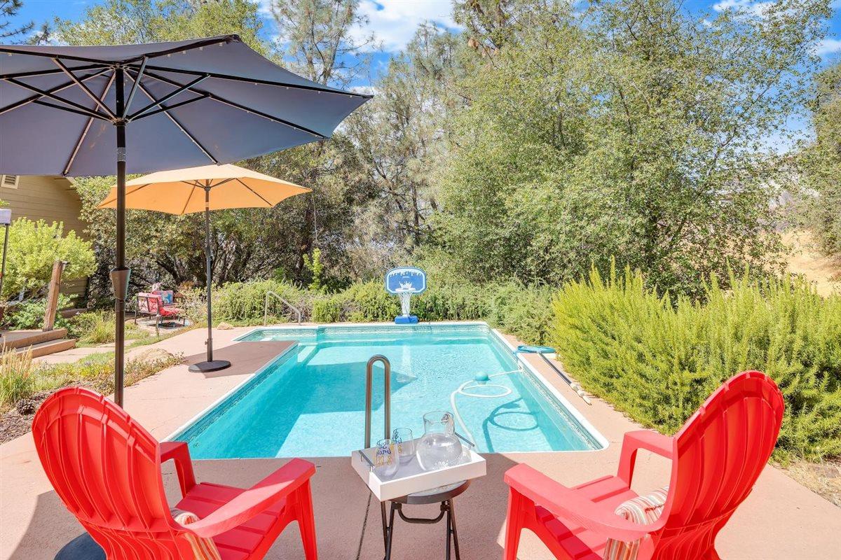 2441 Quail Hill Road, Unit 262 Copperopolis, CA 95228 - Photo 52 of 90 a view of a swimming pool with a patio
