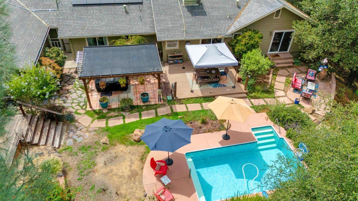 2441 Quail Hill Road, Unit 262 Copperopolis, CA 95228 - Photo 55 of 90 an aerial view of a house with garden space and street view