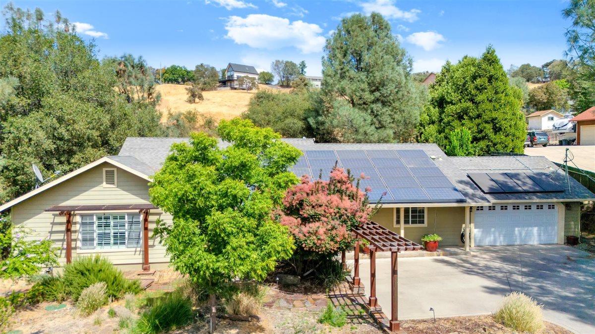 2441 Quail Hill Road, Unit 262 Copperopolis, CA 95228 - Photo 6 of 90 aerial view of a house with a yard and potted plants