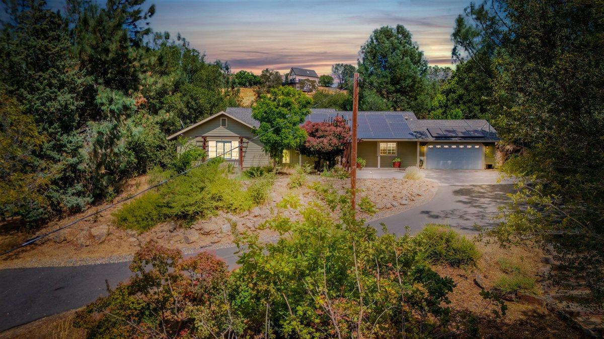 2441 Quail Hill Road, Unit 262 Copperopolis, CA 95228 - Photo 61 of 90 a aerial view of a house with a yard and a large tree