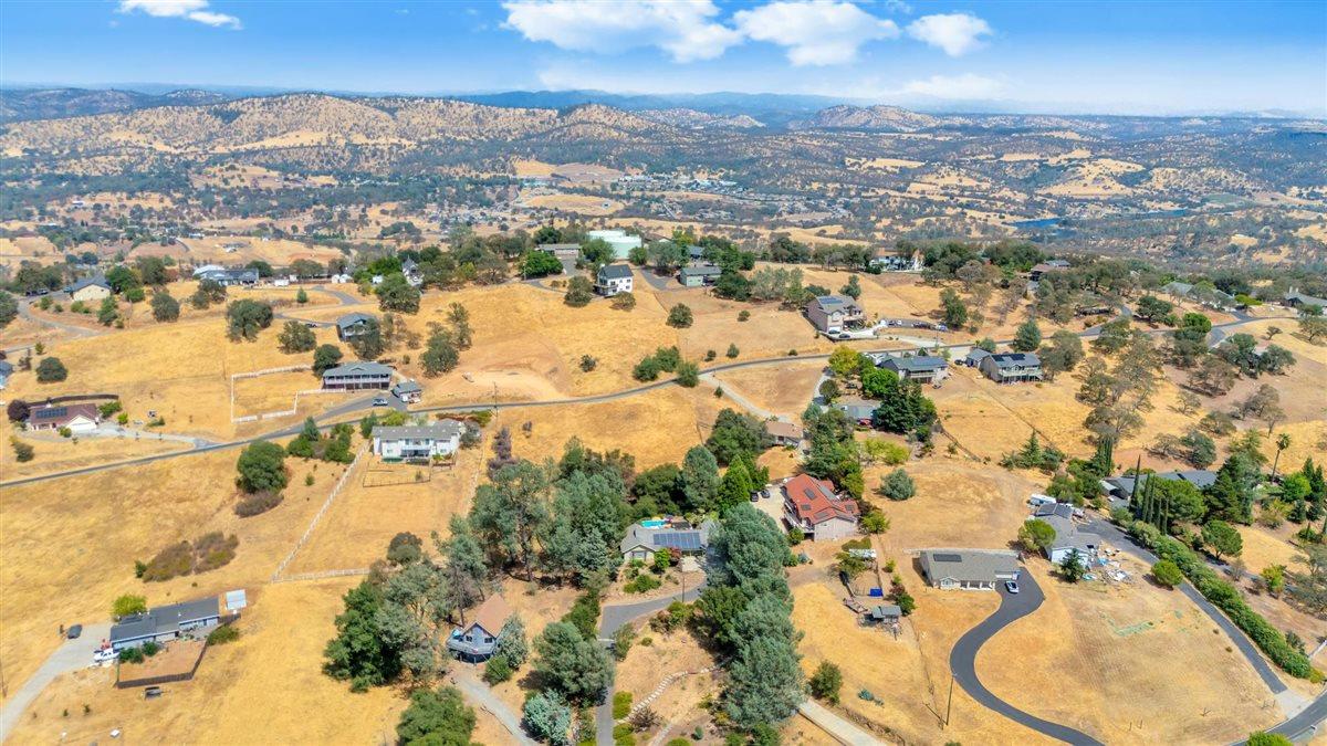 2441 Quail Hill Road, Unit 262 Copperopolis, CA 95228 - Photo 68 of 90 an aerial view of residential houses with outdoor space