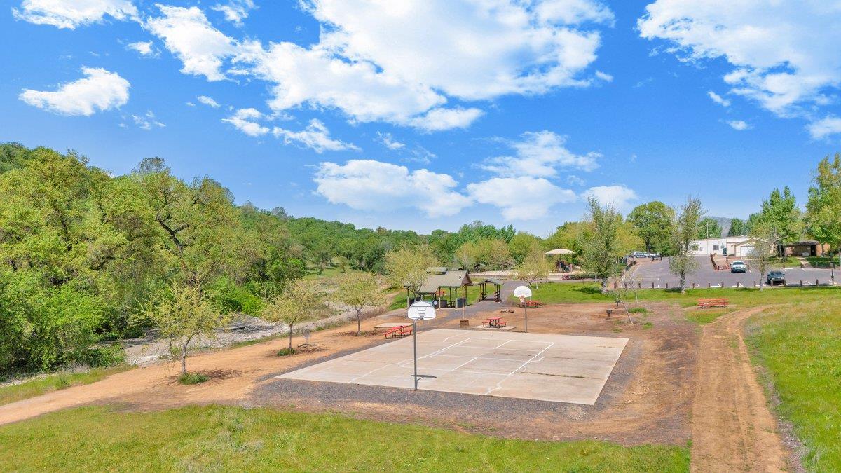 2441 Quail Hill Road, Unit 262 Copperopolis, CA 95228 - Photo 79 of 90 a view of a playground with basketball court