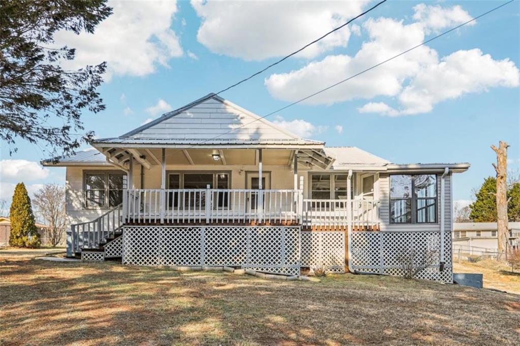 3014 Bronco Lane Gainesville, GA 30507 - Photo 31 of 37 a front view of a house with a garden