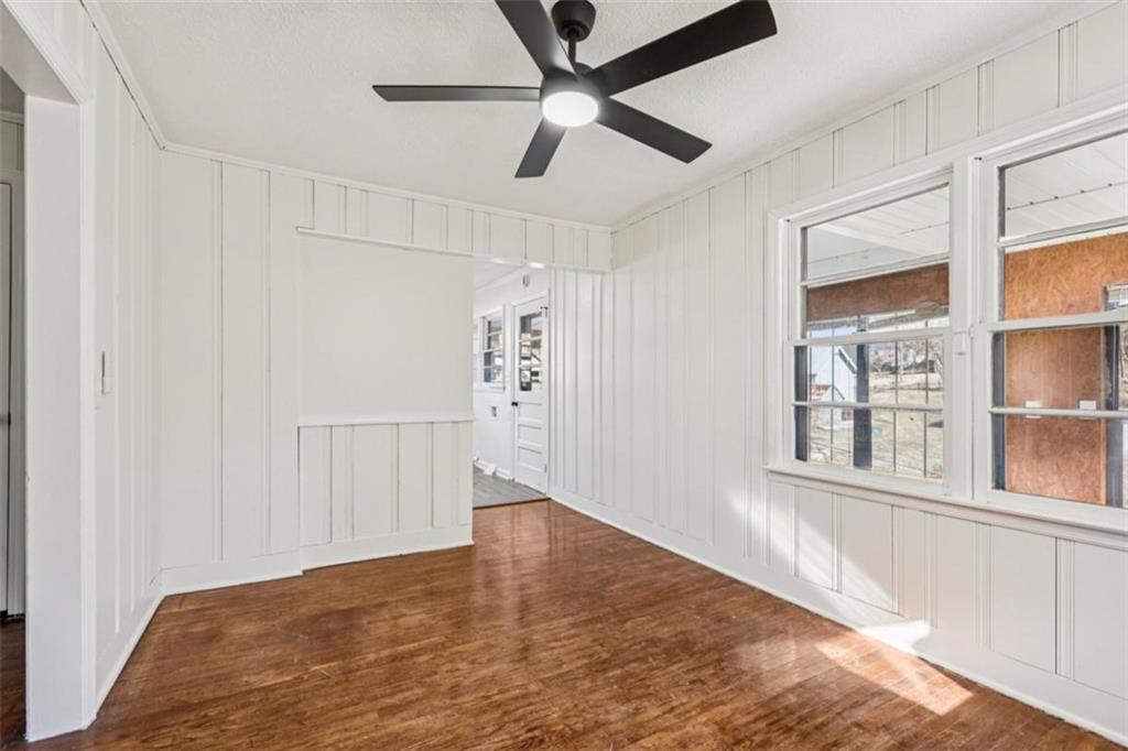 3014 Bronco Lane Gainesville, GA 30507 - Photo 7 of 37 a view of empty room with wooden floor and fan