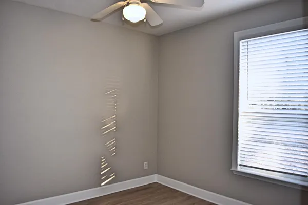 an empty room that has a window