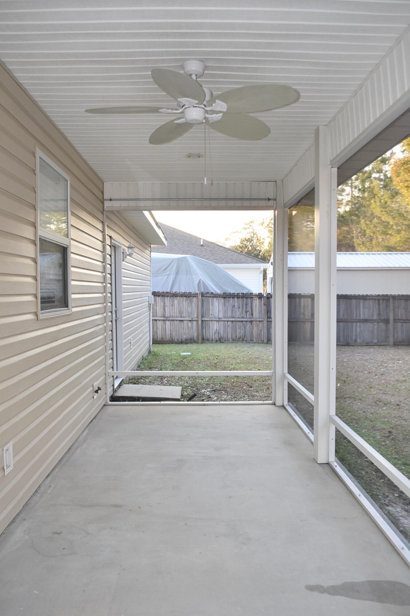 26 Village Lane Freeport, FL 32439 - Photo 31 of 37 31_ Screened-in Porch