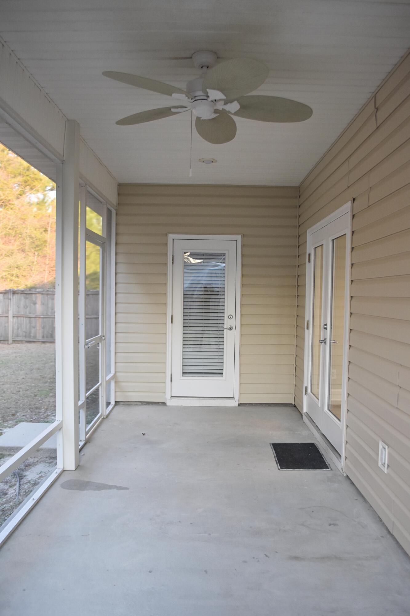 26 Village Lane Freeport, FL 32439 - Photo 32 of 37 32_ Screened-in Porch