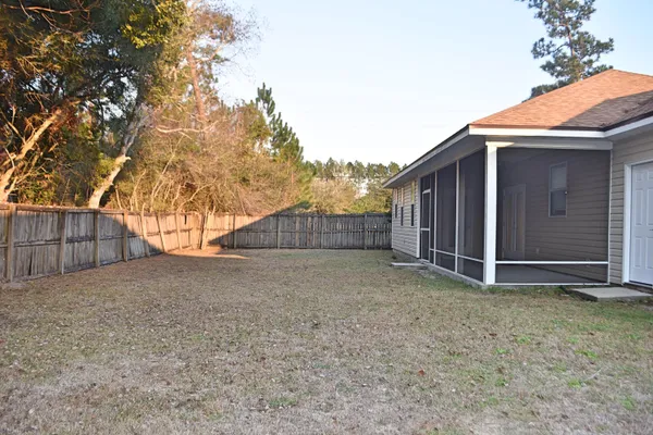 a view of backyard of house