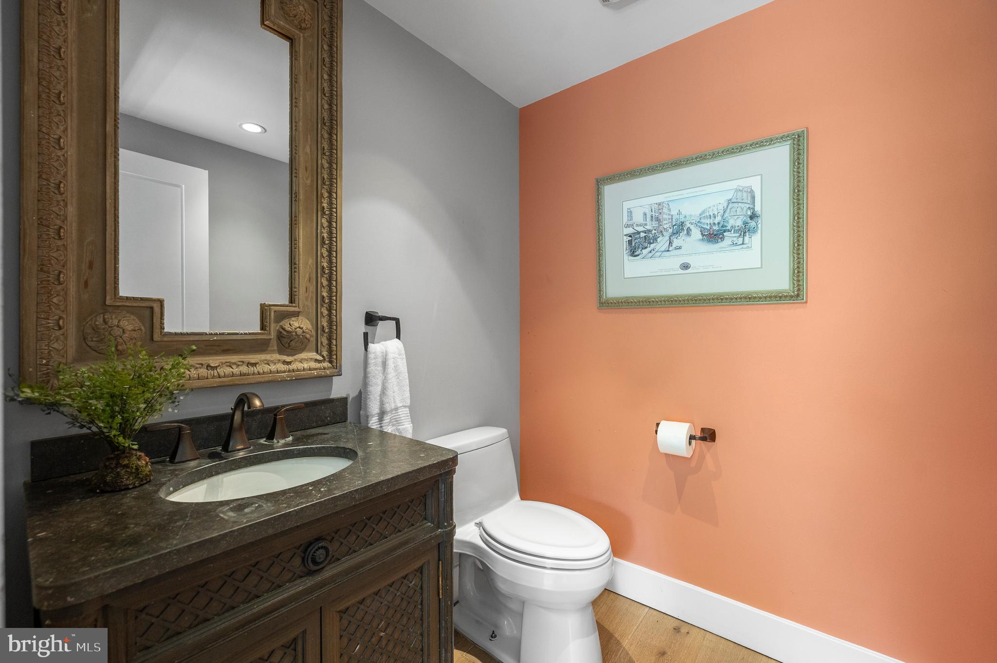 25 Bodine Road Berwyn, PA 19312 - Photo 23 of 73 a bathroom with a granite countertop sink and a mirror