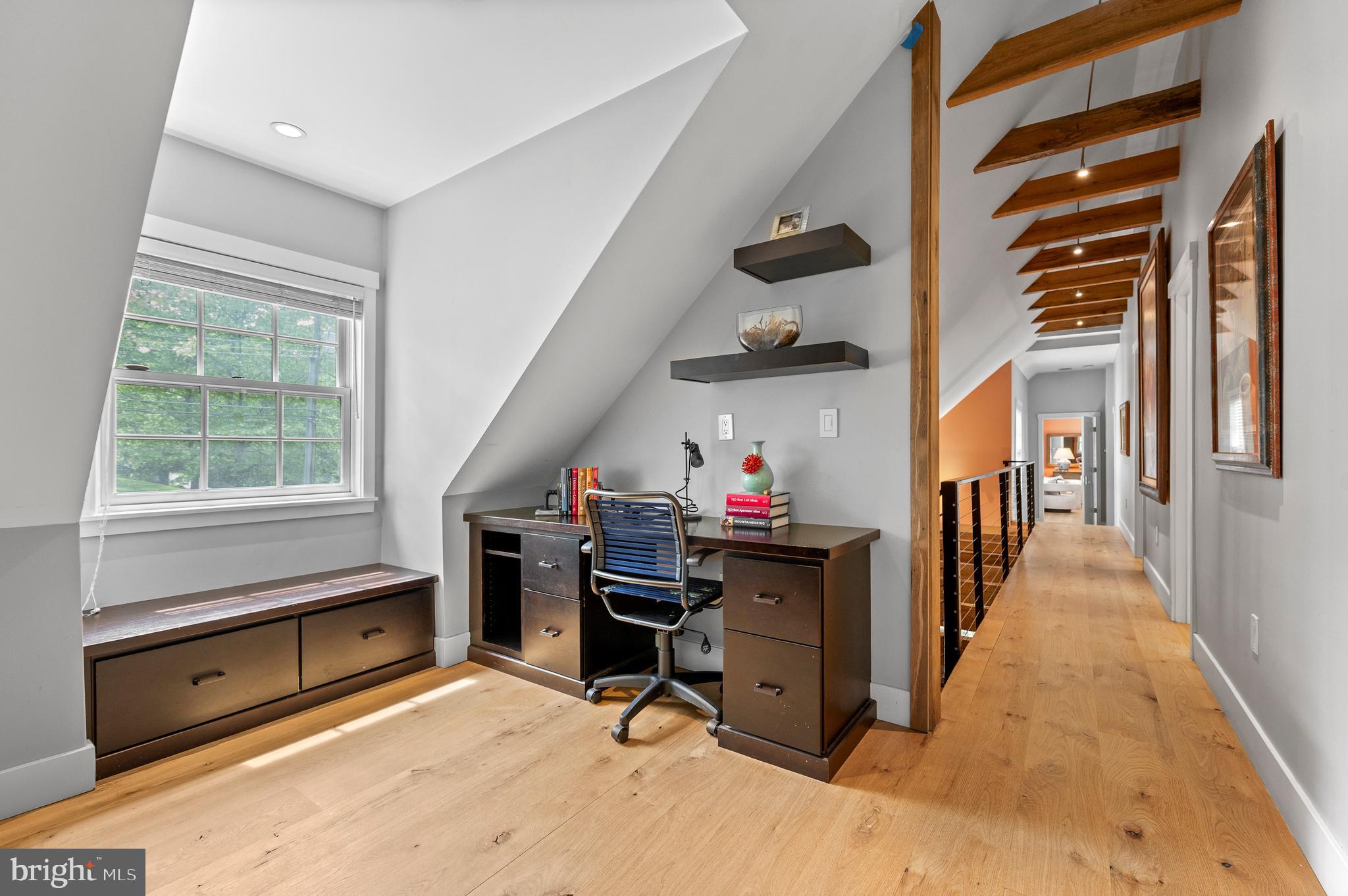 25 Bodine Road Berwyn, PA 19312 - Photo 35 of 73 a view of a hallway with workspace and windows