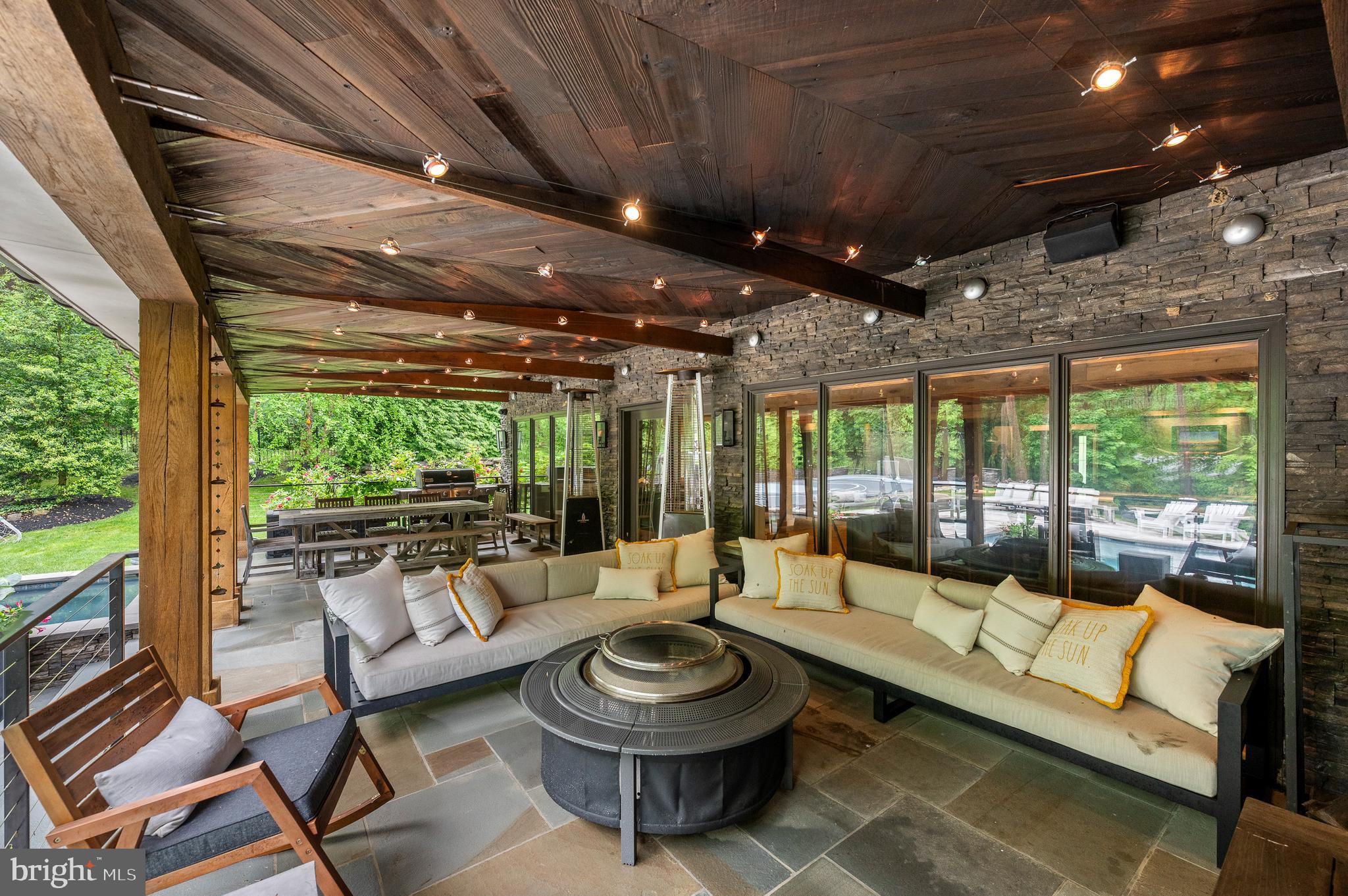 25 Bodine Road Berwyn, PA 19312 - Photo 53 of 73 a living room with patio furniture and a large window