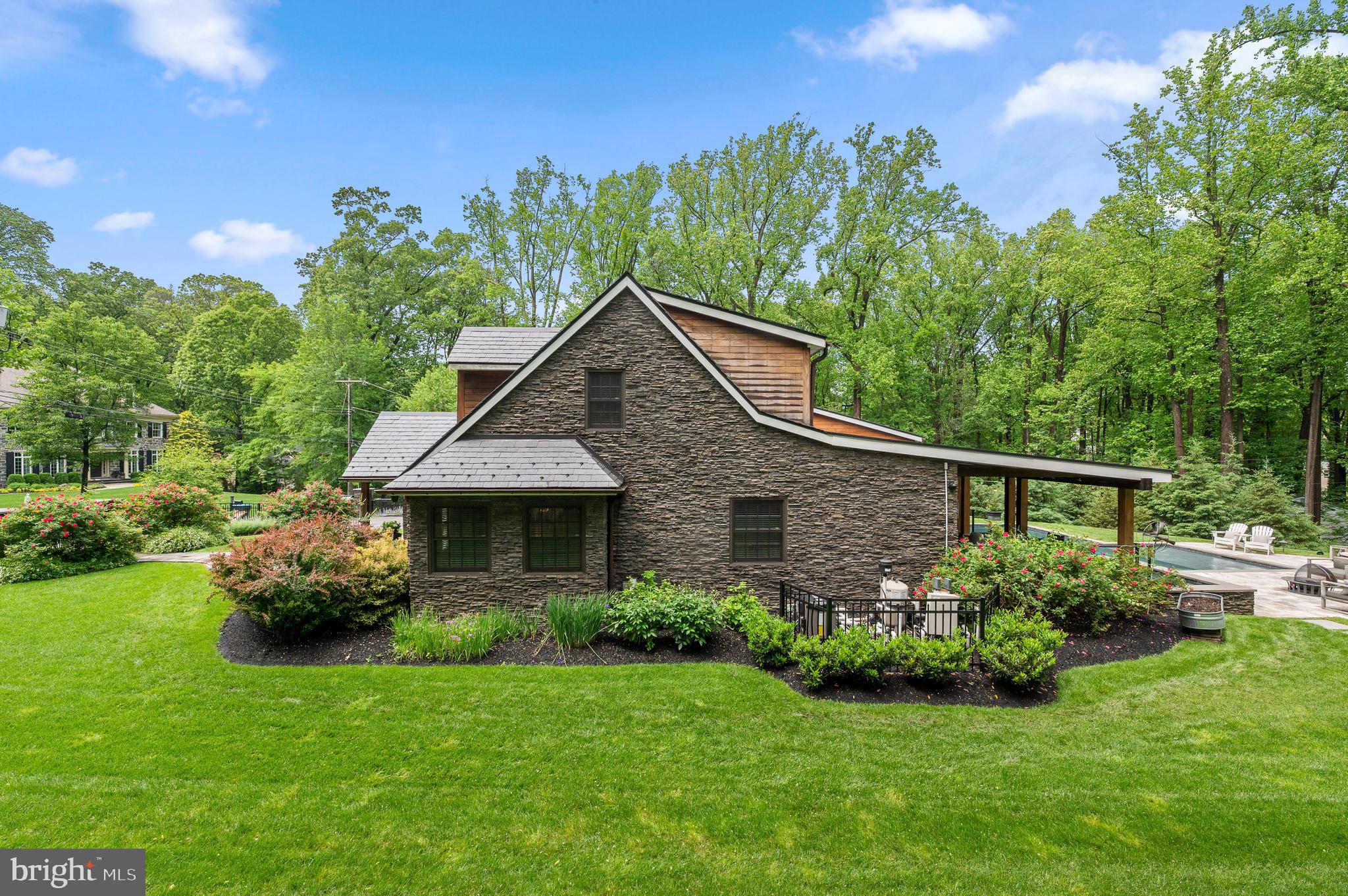 25 Bodine Road Berwyn, PA 19312 - Photo 67 of 73 a front view of a house with garden