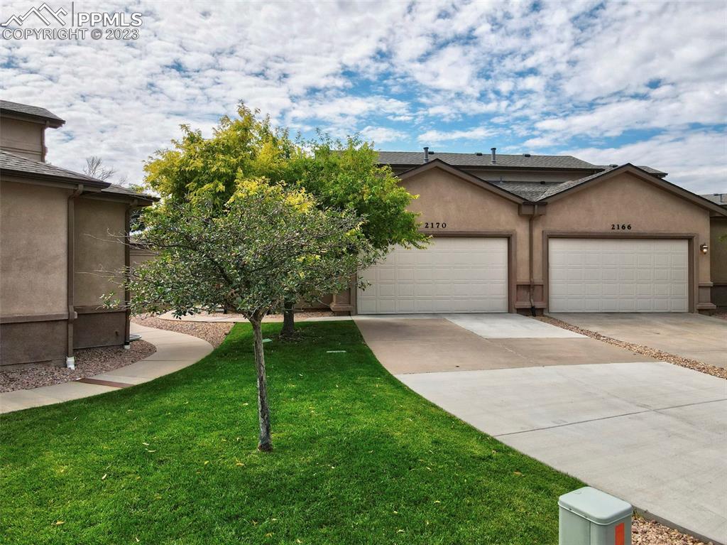 2170 Alpine Shadows View Colorado Springs, CO 80919 - Photo 15 of 49 a house view with a garden space