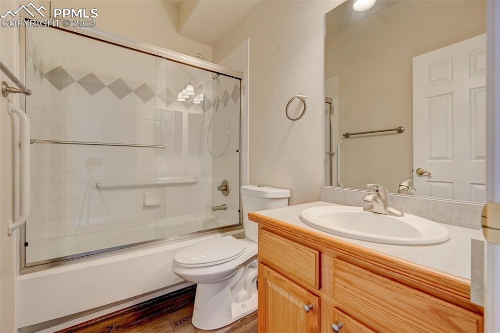 2170 Alpine Shadows View Colorado Springs, CO 80919 - Photo 32 of 49 a bathroom with a sink a toilet and shower