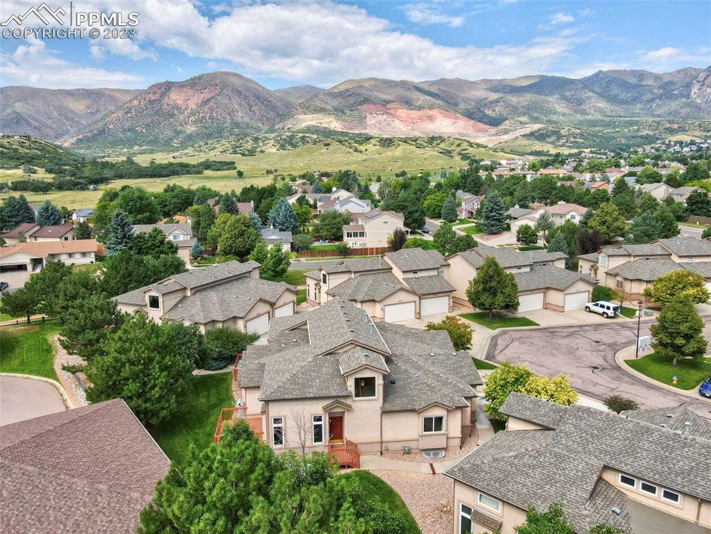 2170 Alpine Shadows View Colorado Springs, CO 80919 - Photo 45 of 49 an aerial view of residential houses with outdoor space and city view