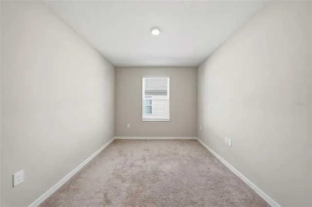 an empty room with a window