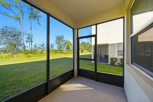 a view of a garden with an outdoor space