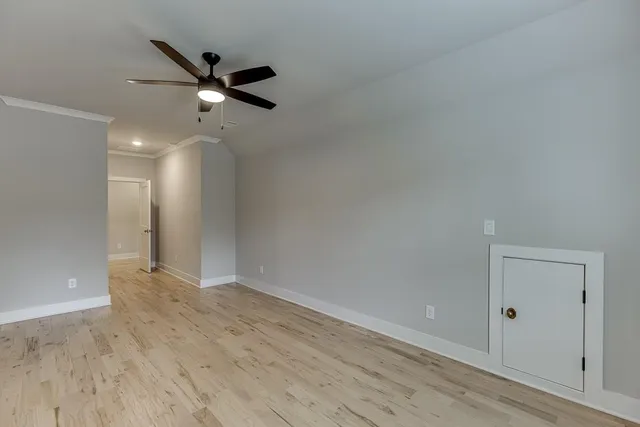 a view of balcony with wooden floor