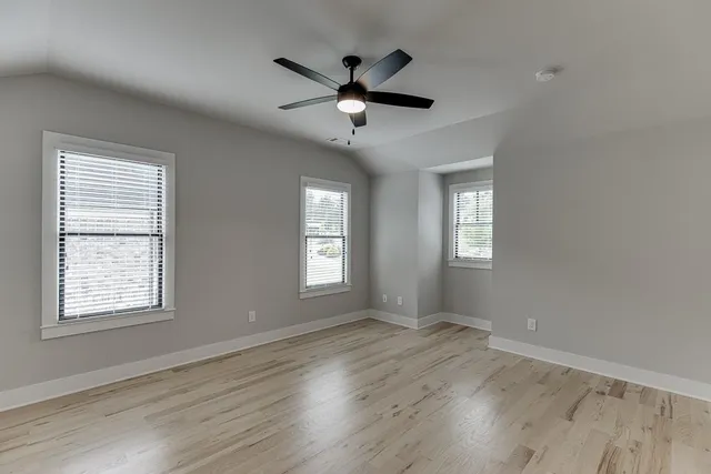 an aerial view of a house with swimming pool
