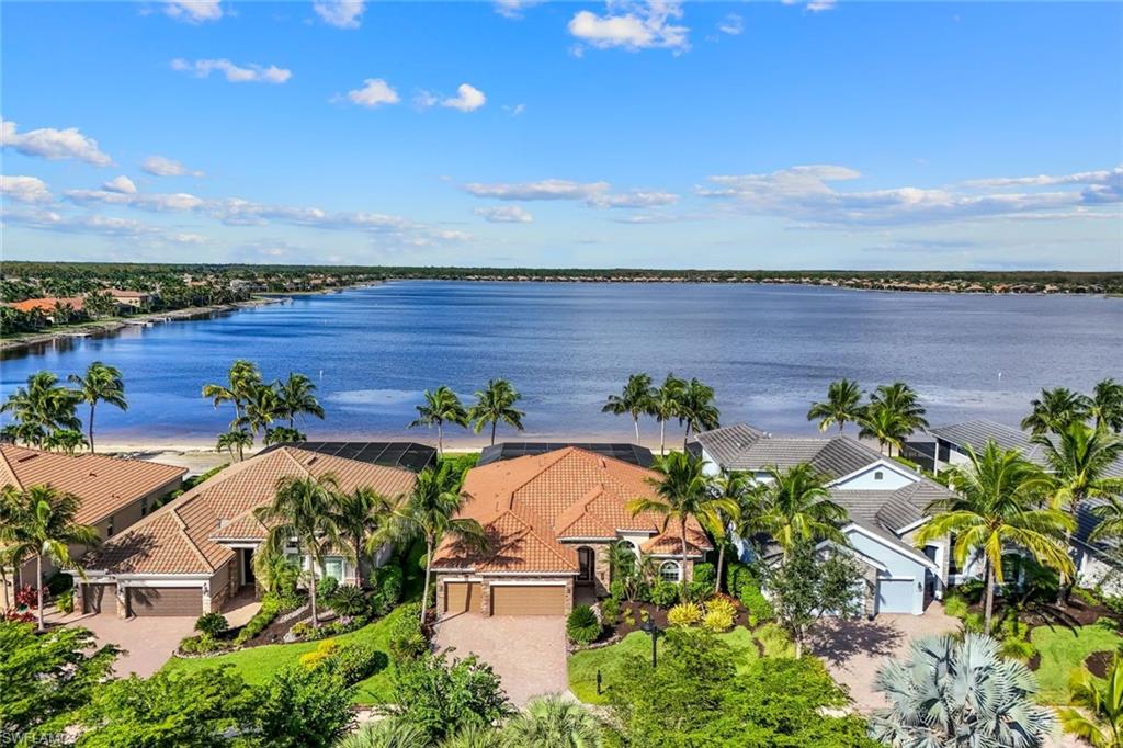 9075 Breakwater Drive Naples, FL 34120 - Photo 3 of 48 an aerial view of a house with a garden