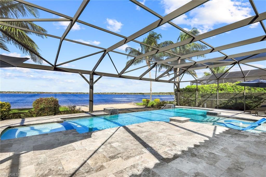 9075 Breakwater Drive Naples, FL 34120 - Photo 31 of 48 a view of yard and porch