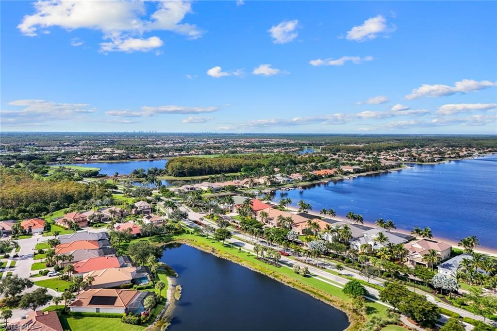 9075 Breakwater Drive Naples, FL 34120 - Photo 4 of 48 an aerial view of a city