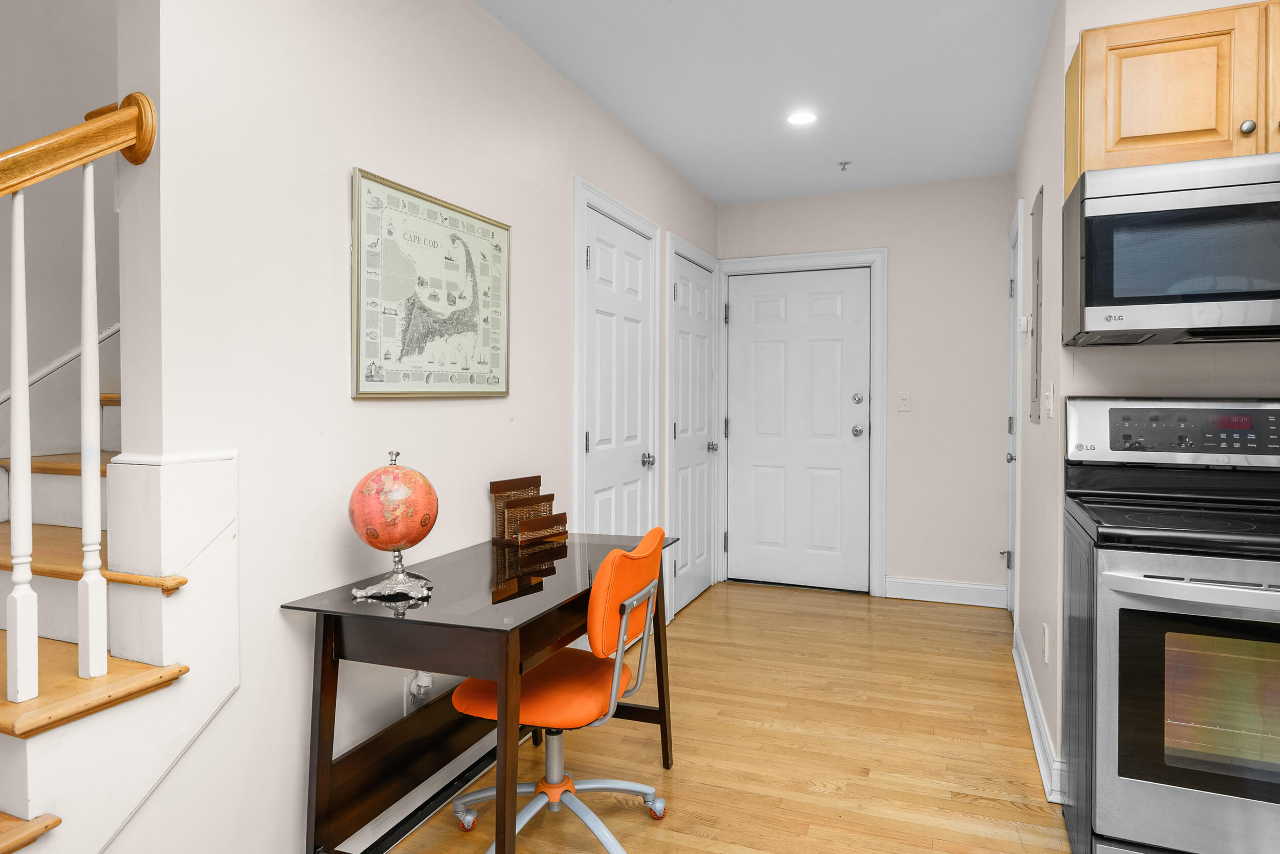 615 Main Street, Unit 3 Hyannis, MA 02601 - Photo 11 of 22 a view of dining room and wooden floor