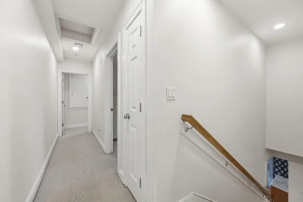 a view of a hallway with closet