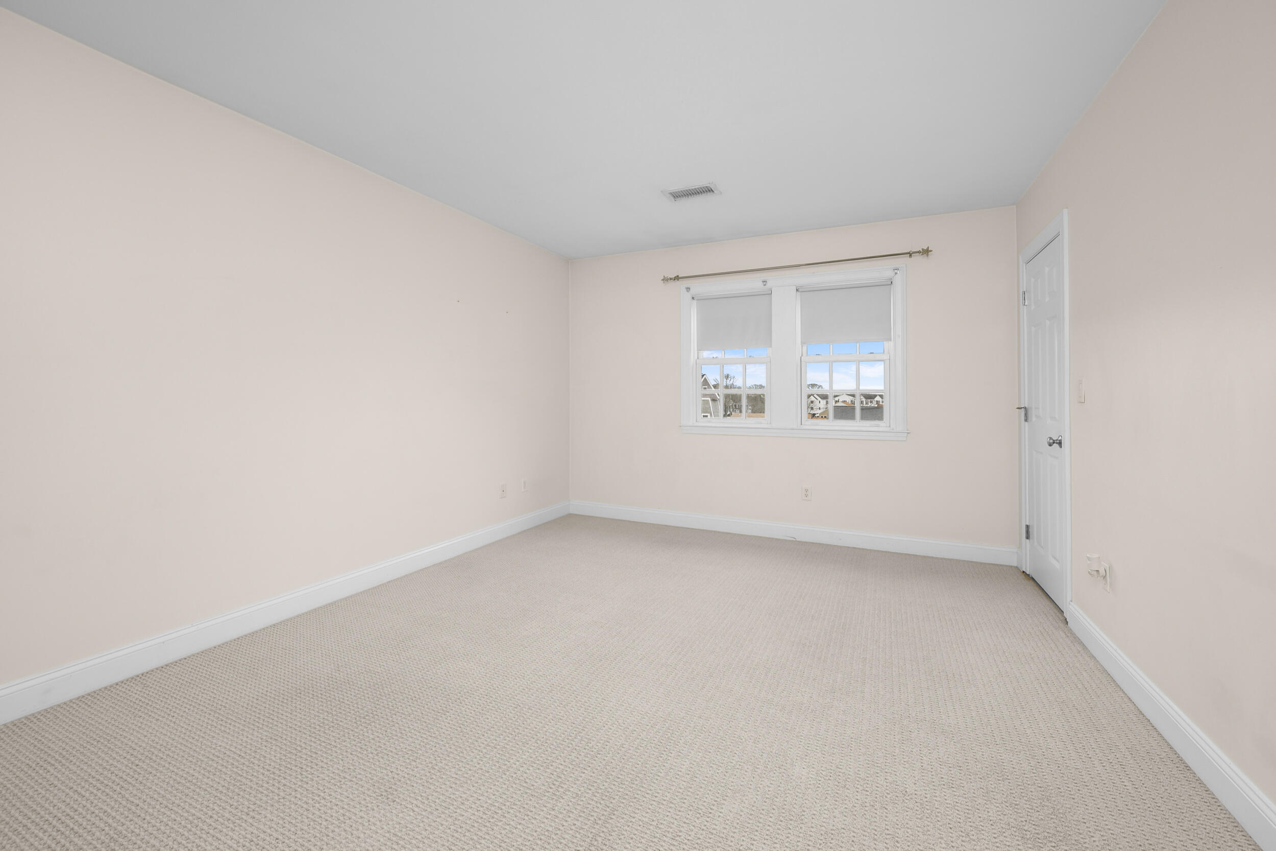 615 Main Street, Unit 3 Hyannis, MA 02601 - Photo 15 of 22 an empty room with a window