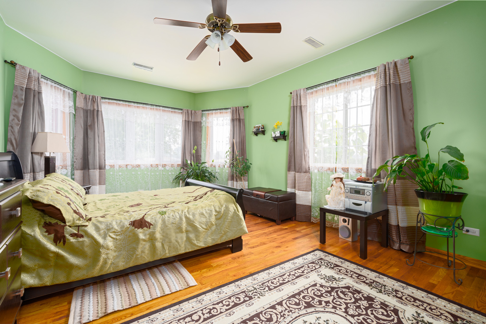 7722 Rutherford Avenue Burbank, IL 60459 - Photo 18 of 31 a bedroom with furniture and a window