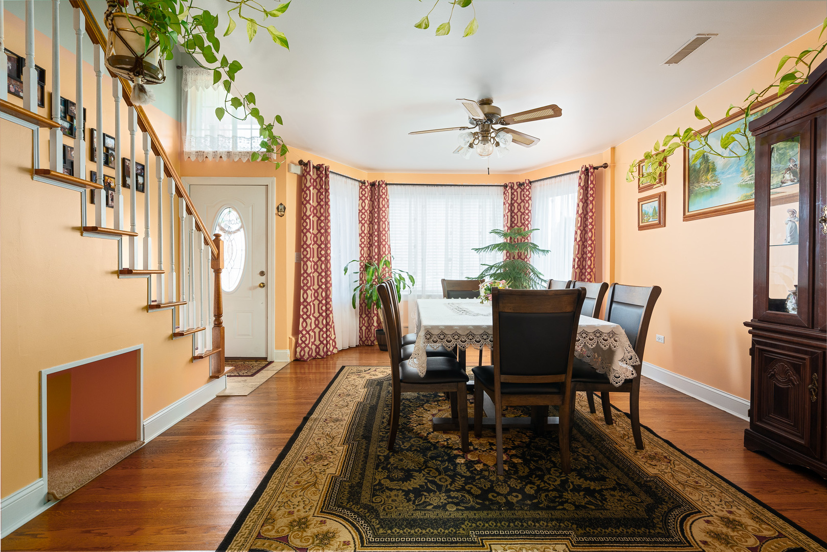 7722 Rutherford Avenue Burbank, IL 60459 - Photo 4 of 31 a view of a dining room with furniture window and wooden floor