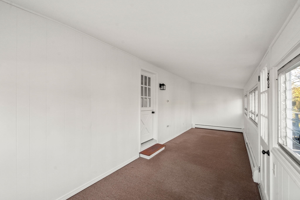 83 Fairhaven Road Mattapoisett, MA 02739 - Photo 11 of 41 an empty room with windows